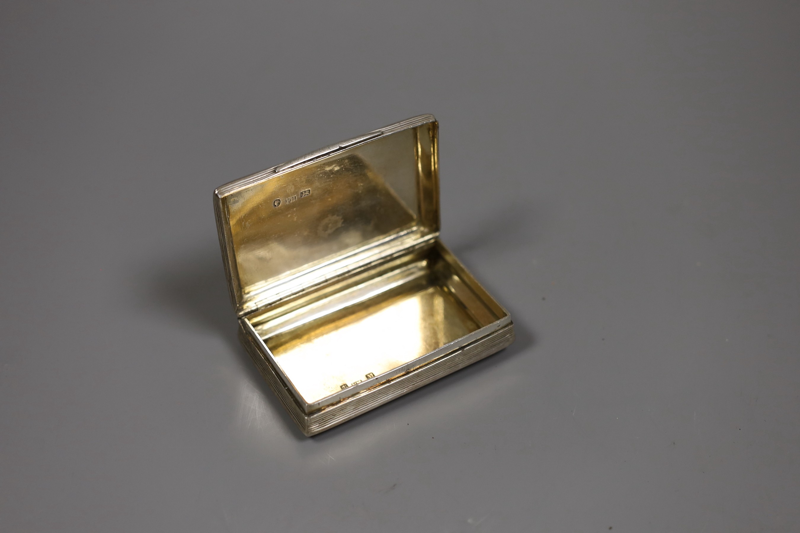 A Victorian engraved silver rectangular snuff box, Frederick Marson, Birmingham, 1861, 84mm.